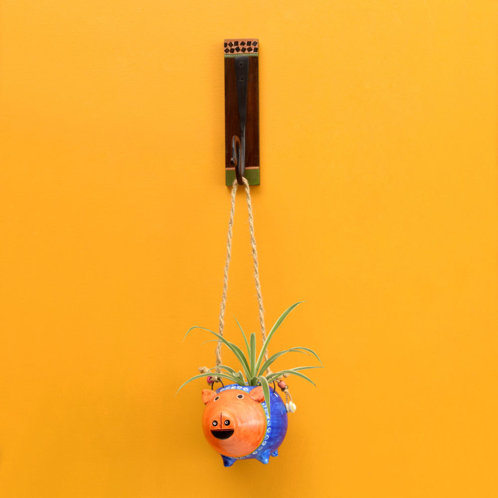 Moorni Blue Pig Earthen Planter on a Classic Wall Hook