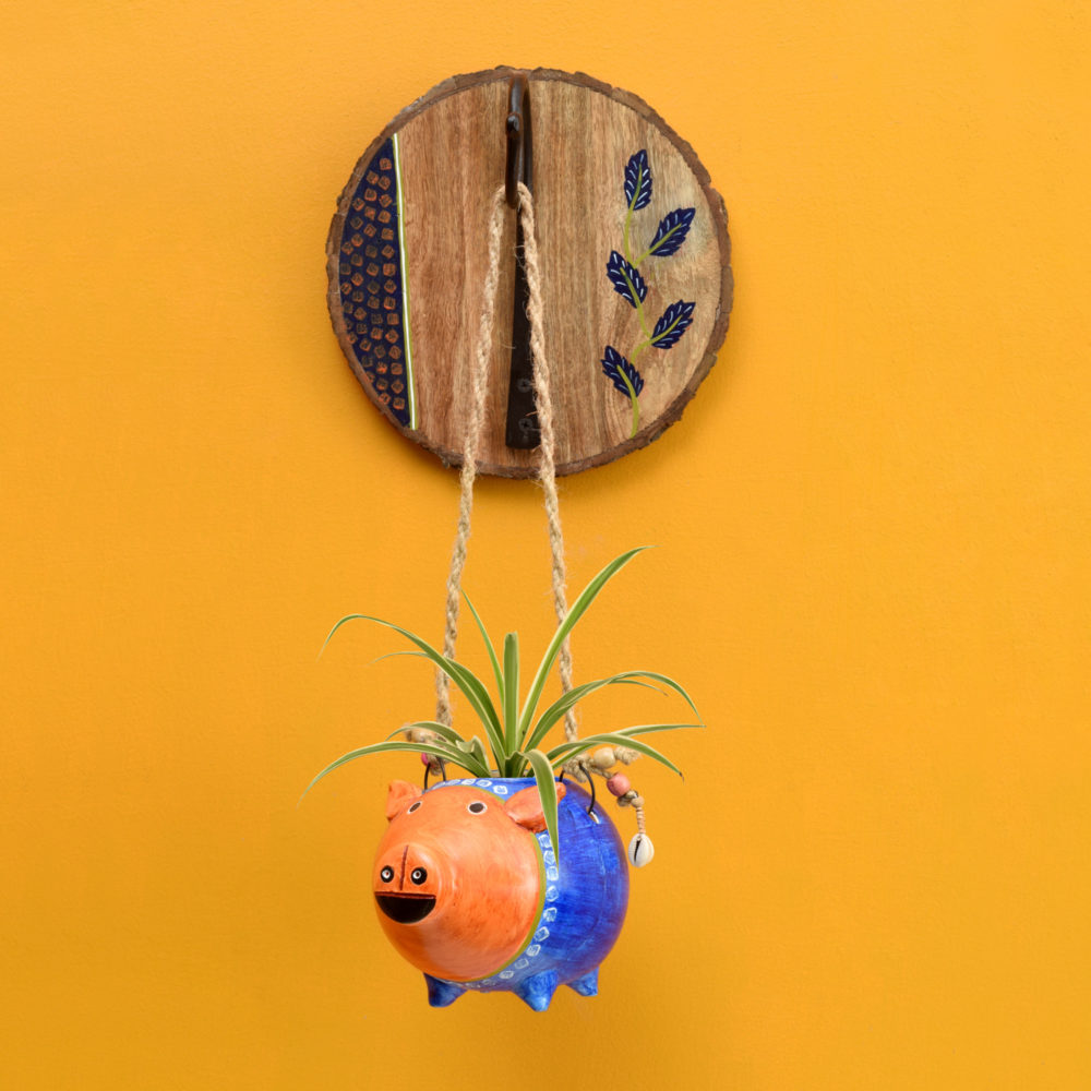 Moorni Blue Pig Earthen Planter on a Round Wall Hook